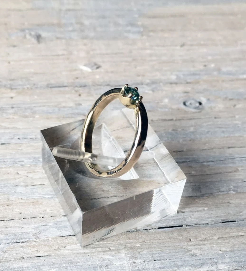 Regal Ring. 4mm Moissenite in 14K yellow gold offset from band. Size 6